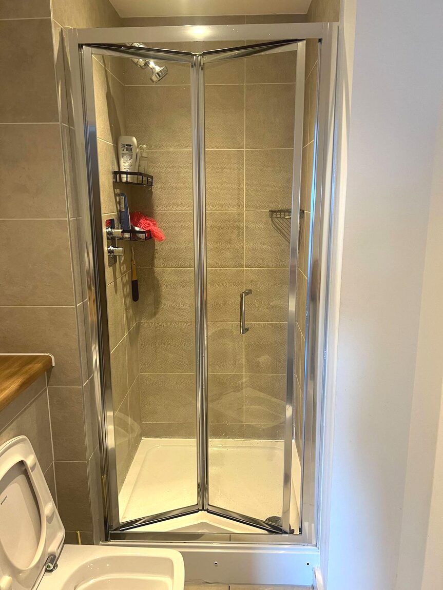 Shower enclosure cleaned to a shine