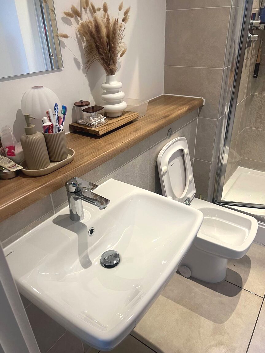 Bathroom basin and shower after cleaning
