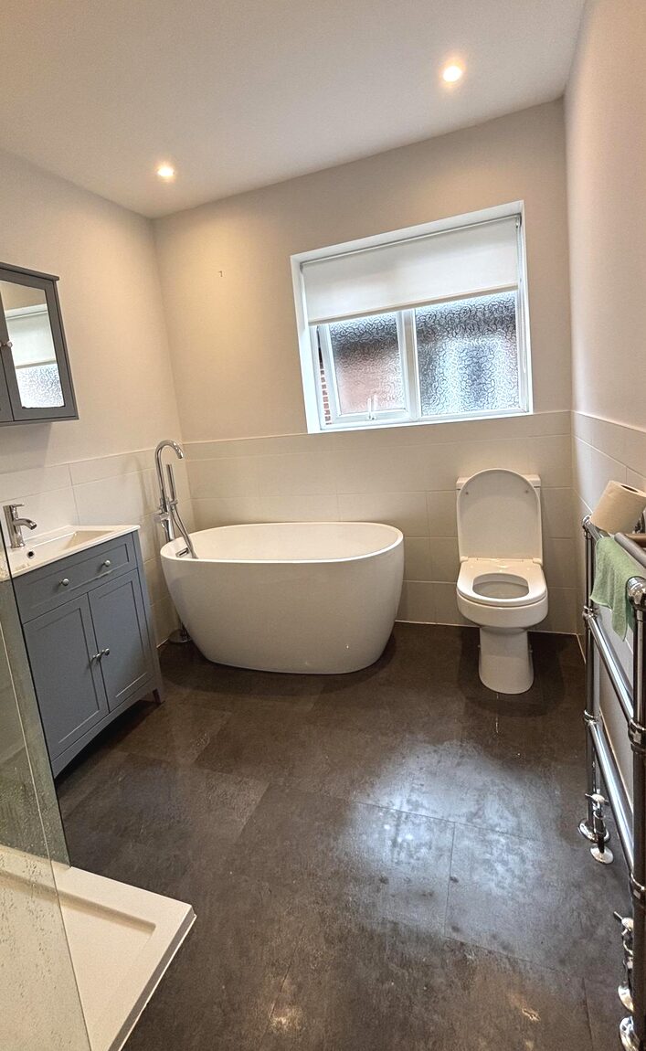 Bathroom with freestanding bath after cleaning